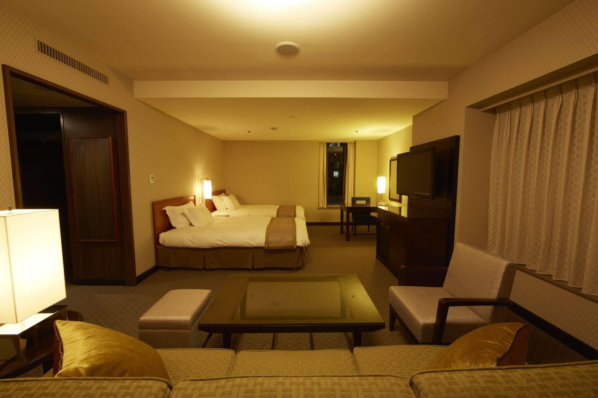 Nagoya Kanko Hotel Exterior foto A room at the hotel